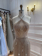 Luxury Nude Halter Crystal Beaded Mermaid Dress With Bow Back LA73687A