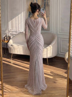 Luxury Nude Long Sleeve Pearl Beaded Mermaid Evening Dress LA73858