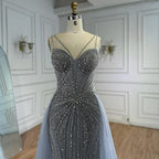 Luxury Nude Spaghetti Strap Mermaid Evening Dress with Overskirt Beaded CLA73090A